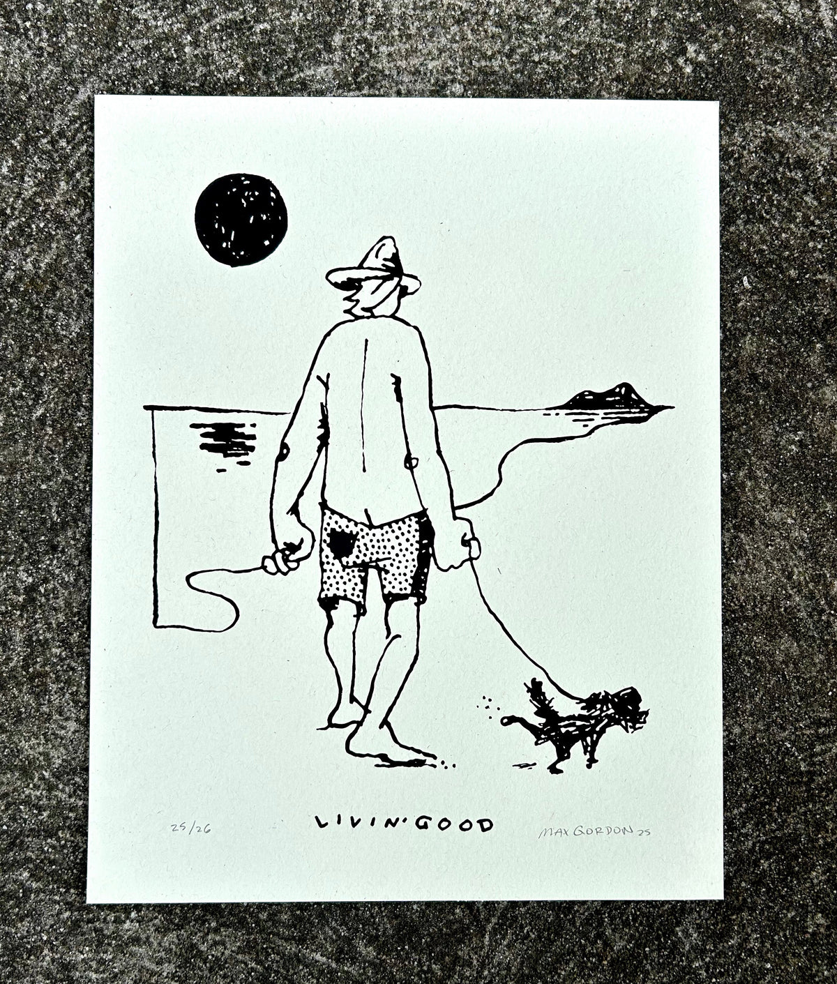 A black and white art print featuring a minimalist line drawing of a man holding a dog on a leash, with the text 'LIVING GOOD' at the bottom, displayed on a textured gray background.