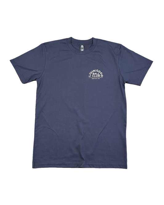 A navy blue short-sleeve crewneck t-shirt with a small white circular graphic printed on the left chest, displayed flat against a solid white background.